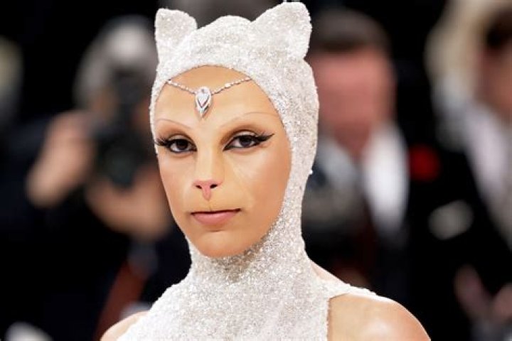 Doja Cat pumps up feline energy in tub of milk for ‘Streets’ live