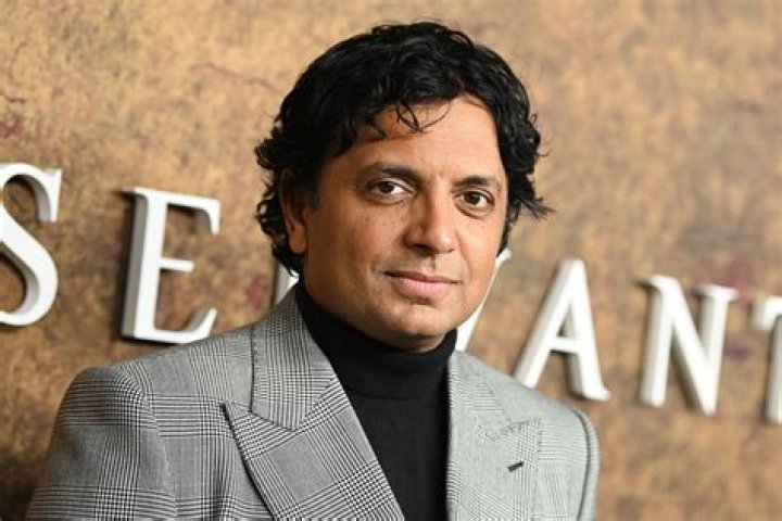 M. Night Shyamalan (Director) And His Wife At Premiere Of Signs Ny